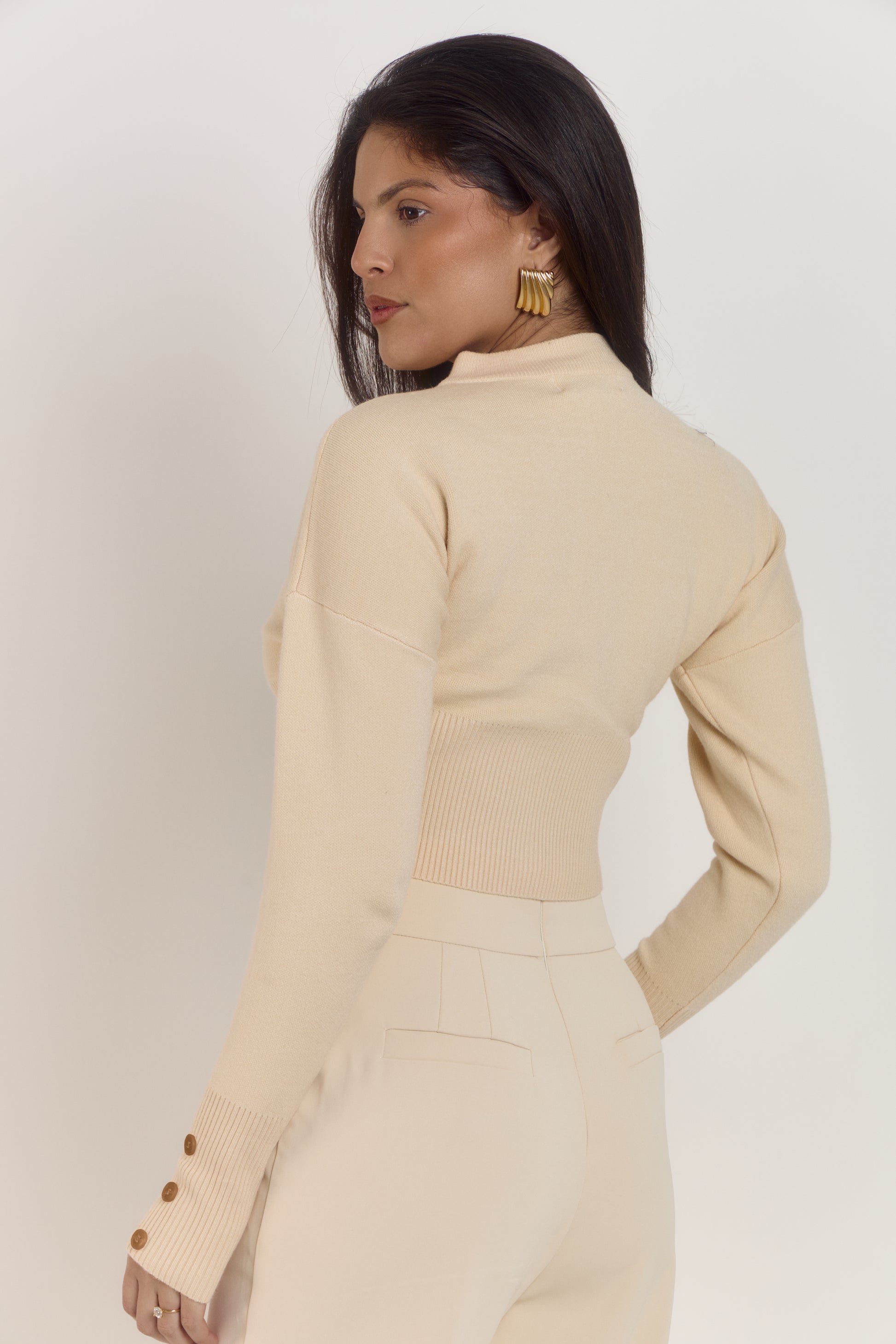 Soft almond latte cardigan featuring a fitted sculpting waist, statement buttons and wide sleeves with tapered cuffs