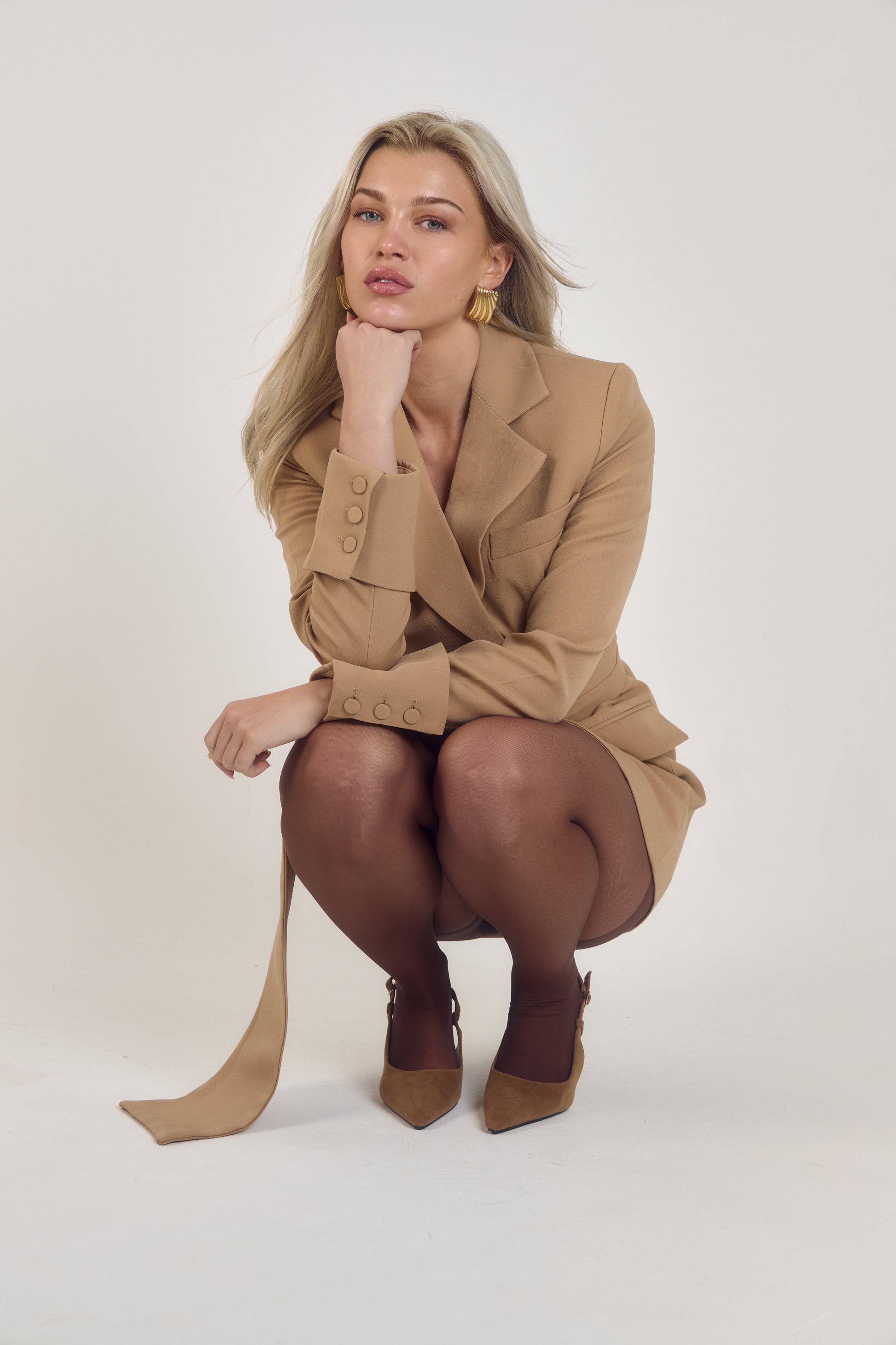 Front view of the Signature Oversized Belted Blazer Dress in Caramel Crème by Ardore London, featuring an oversized silhouette with a belted waist, soft caramel tone, and structured tailoring for effortless modern elegance