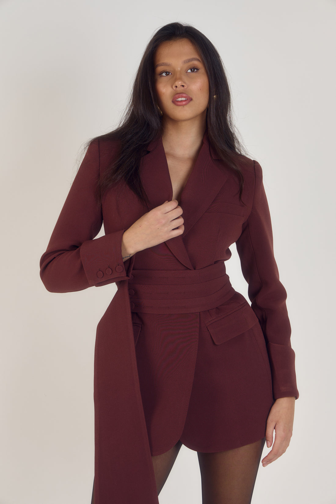 Ardore London’s premium burgundy tailored belted blazer dress in cherry chocolate, highlighting the oversized silhouette, structured tailoring, and luxurious fabric perfect for versatile styling