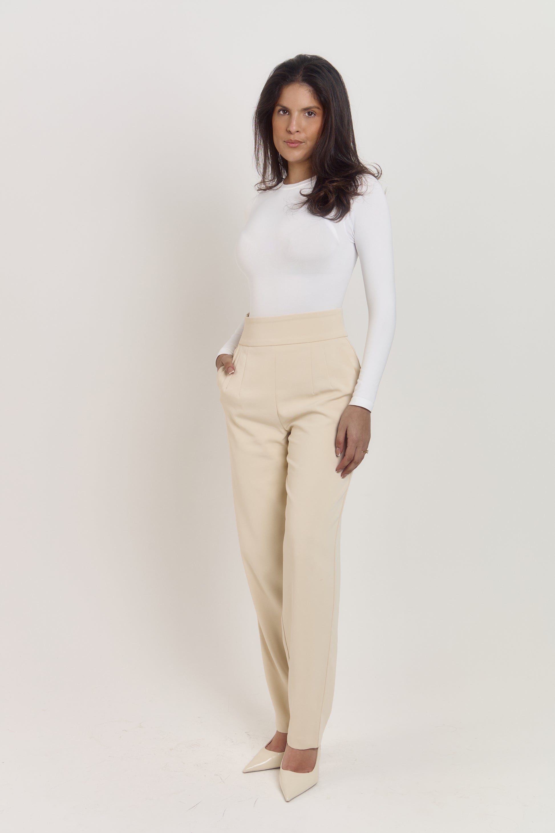 White body shaper bodysuit designed for tummy smoothing and shaping.