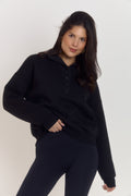 Oversized cotton collared black quarter button sweater for women with structured collar, soft interior lining and embroidered Ardore logo detail.