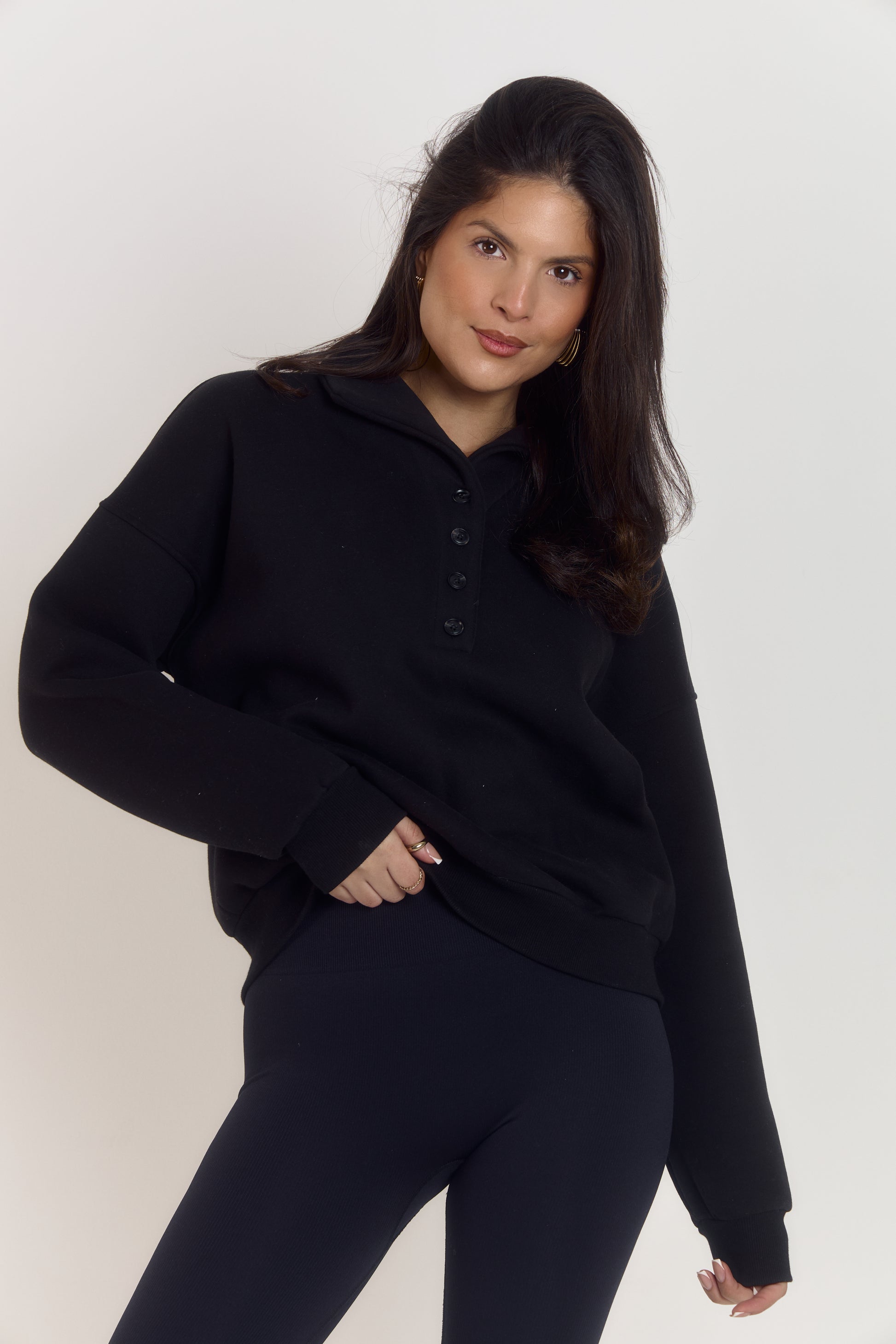 Oversized cotton collared black quarter button sweater for women with structured collar, soft interior lining and embroidered Ardore logo detail.