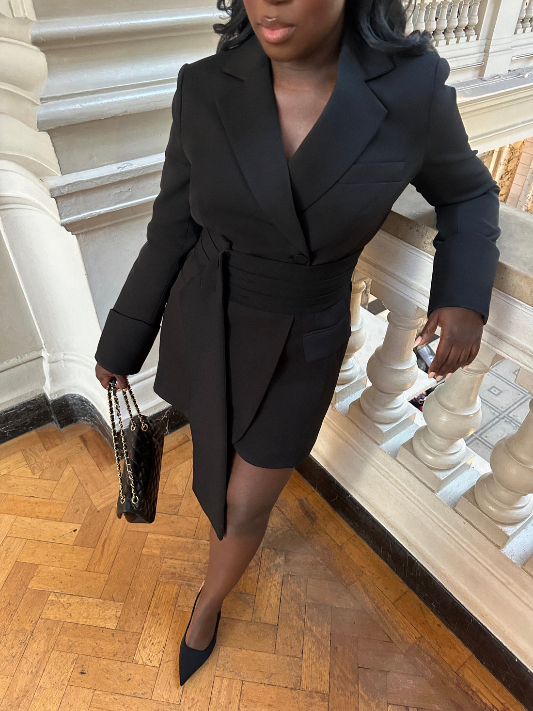 Front view of the Signature Oversized Belted Blazer Dress in Classic Noire by Ardore London, featuring a cinched waist with a tailored belt, structured shoulders, and sharp lapels — a bold and versatile piece perfect for elevated office style and chic evening wear.
