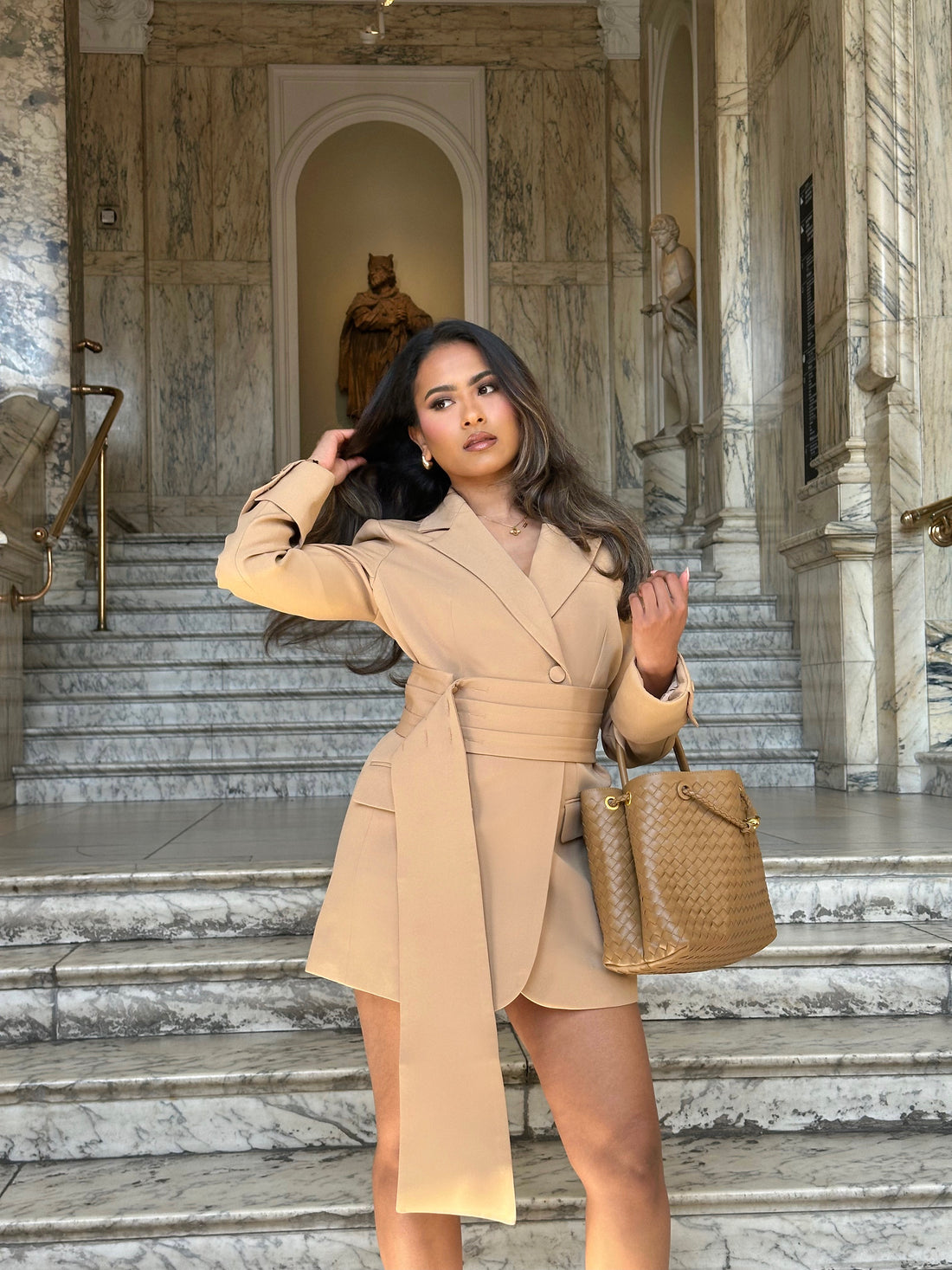 Close-up front view of the Signature Oversized Belted Blazer Dress in Caramel Crème by Ardore London, showcasing the tailored belt cinching the waist, soft caramel fabric texture, and structured lapels — perfect for chic office and evening wear.
