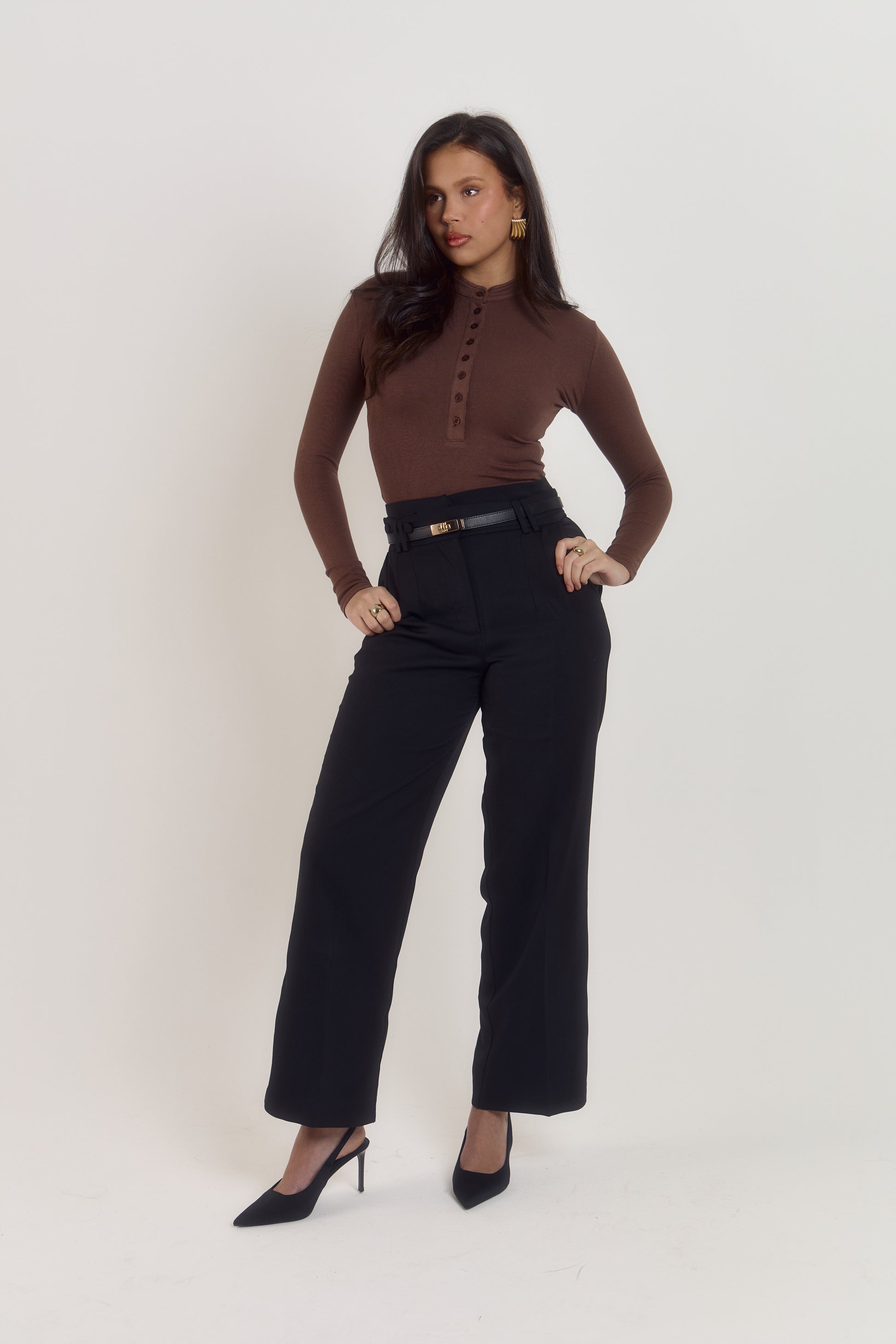 Cocoa brown cotton ribbed long sleeve bodysuit with pearlised button front and fitted silhouette.