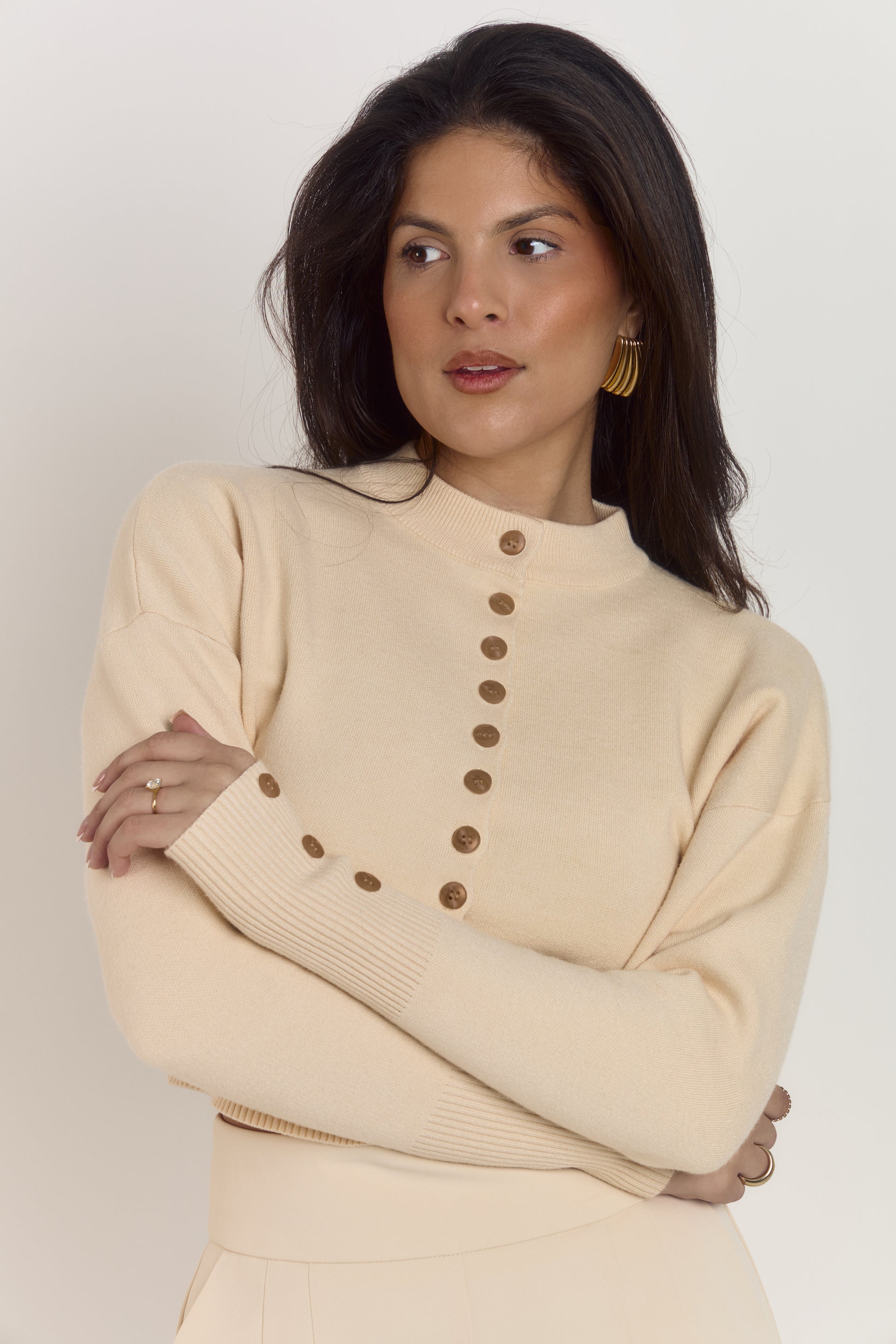 Mid-length almond latte cardigan with structured waist, triple button cuffs and a high rounded collar