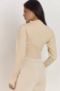 Waist contouring cream cardigan with soft cosy fabric and sculpted fit.