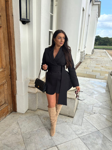 Front view of the Signature Oversized Belted Blazer Dress in Classic Noire by Ardore London, featuring sharp lapels, structured shoulders, and a cinched waist with a tailored belt — a modern black blazer dress that defines the silhouette for powerful office or evening wear.