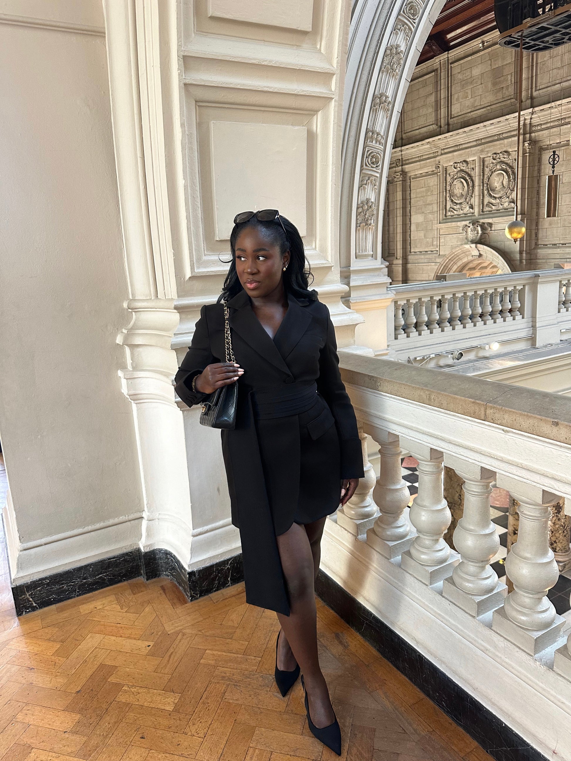 Front view of the Signature Oversized Belted Blazer Dress in Classic Noire by Ardore London, featuring a cinched waist with a tailored belt, structured shoulders, and sharp lapels — a bold and versatile piece perfect for elevated office style and chic evening wear.