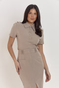 Taupe pinstripe two-piece outfit styled for office meetings and smart city wear.
