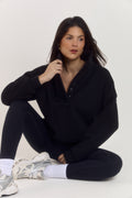 Relaxed oversized black cotton collared sweater with heavyweight fabric and embroidered Ardore logo detail.