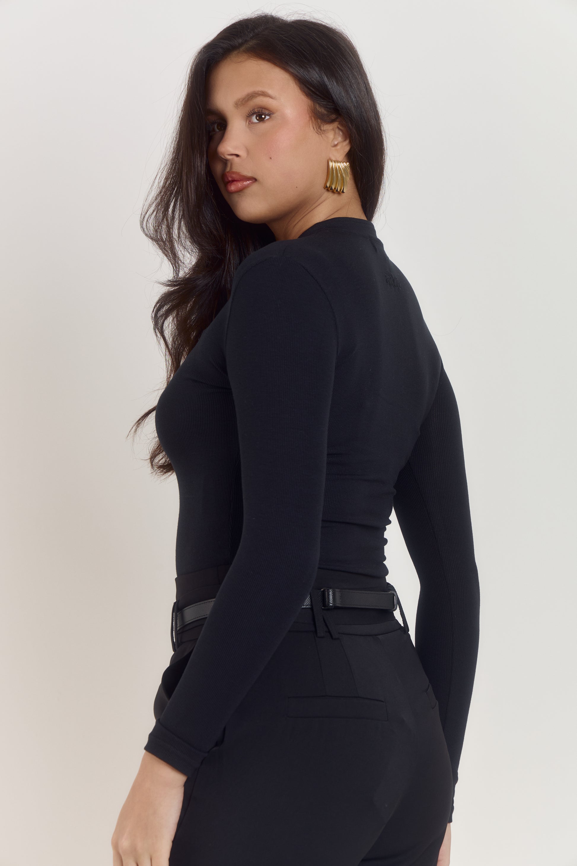 Black long sleeve cotton bodysuit with smooth second skin finish.