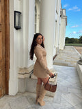 Side view of the Signature Oversized Belted Blazer Dress in Caramel Crème by Ardore London, showcasing the flowing oversized silhouette, belted waist, and warm caramel fabric texture for a chic and contemporary look