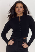 Women’s classic noir fitted cardigan with waist defining silhouette and functional anti-gape button placement.