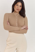 Caramel Créme cotton ribbed long sleeve bodysuit with pearlised button front and fitted tan silhouette.