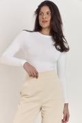 Classic Blanc long sleeve compression bodysuit creating a contoured fit.