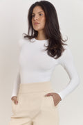 Classic Blanc compression bodysuit with sleek streamlined silhouette.