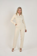 Full view of Ardore London Vanilla Crème structured long sleeve sculpted blouse paired with cream trousers, offering a chic city look with sculpted tailoring, signature triple-button cuffs, exaggerated collar, and luxurious fabric—perfect for office elegance and sophisticated day-to-night style.