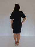 Back close-up of Ardore London Sculpting Short Sleeve Buttoned Knee Length Dress in Midnight Bleu, highlighting the flattering silhouette, long back zip, and fully lined design for a smooth, polished office look.