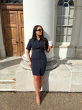 Full front view of Ardore London Sculpting Short Sleeve Buttoned Knee Length Dress in Midnight Bleu, offering a polished, office-ready look with flattering curved seams, structured collar, and functional pockets for a sleek, professional appearance.