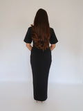 Back view of Ardore London Sculpting Short Sleeve Buttoned Maxi Dress in Classic Noire, featuring the elegant structured silhouette, long back zip, and fully lined design for a smooth, chic look.