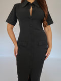 Close-up of Ardore London Classic Noire Sculpting Maxi Dress, featuring luxurious fabric, chic curved seams, and a structured collar. The partially non-functional buttons and hidden button add a refined, thoughtful detail to this elegant piece.