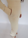 Side close-up of Ardore London Vanilla Crème high-waisted straight leg trousers, showcasing the cinched high waist, sleek silhouette, and functional side pockets for a flattering, polished look.