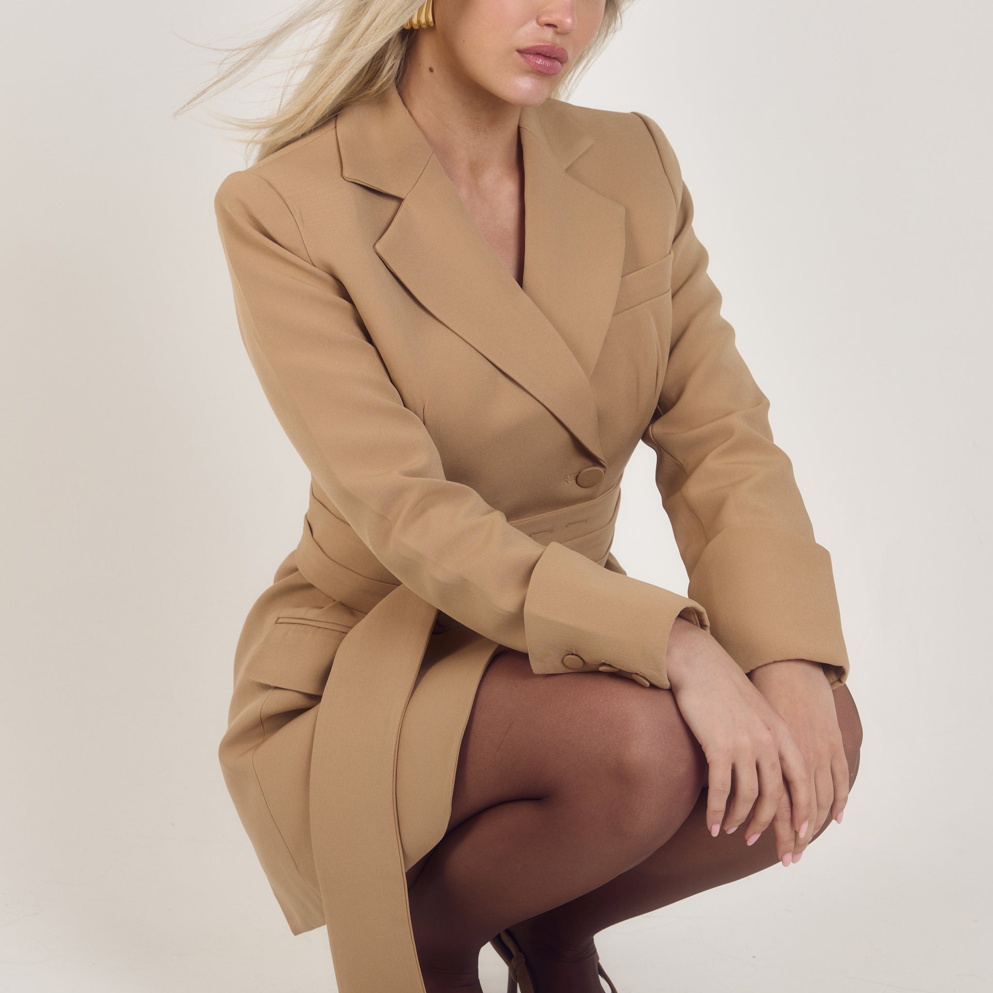 Front view of the Signature Oversized Belted Blazer Dress in Caramel Crème by Ardore London, featuring an oversized silhouette with a belted waist, soft caramel tone, and structured tailoring for effortless modern elegance