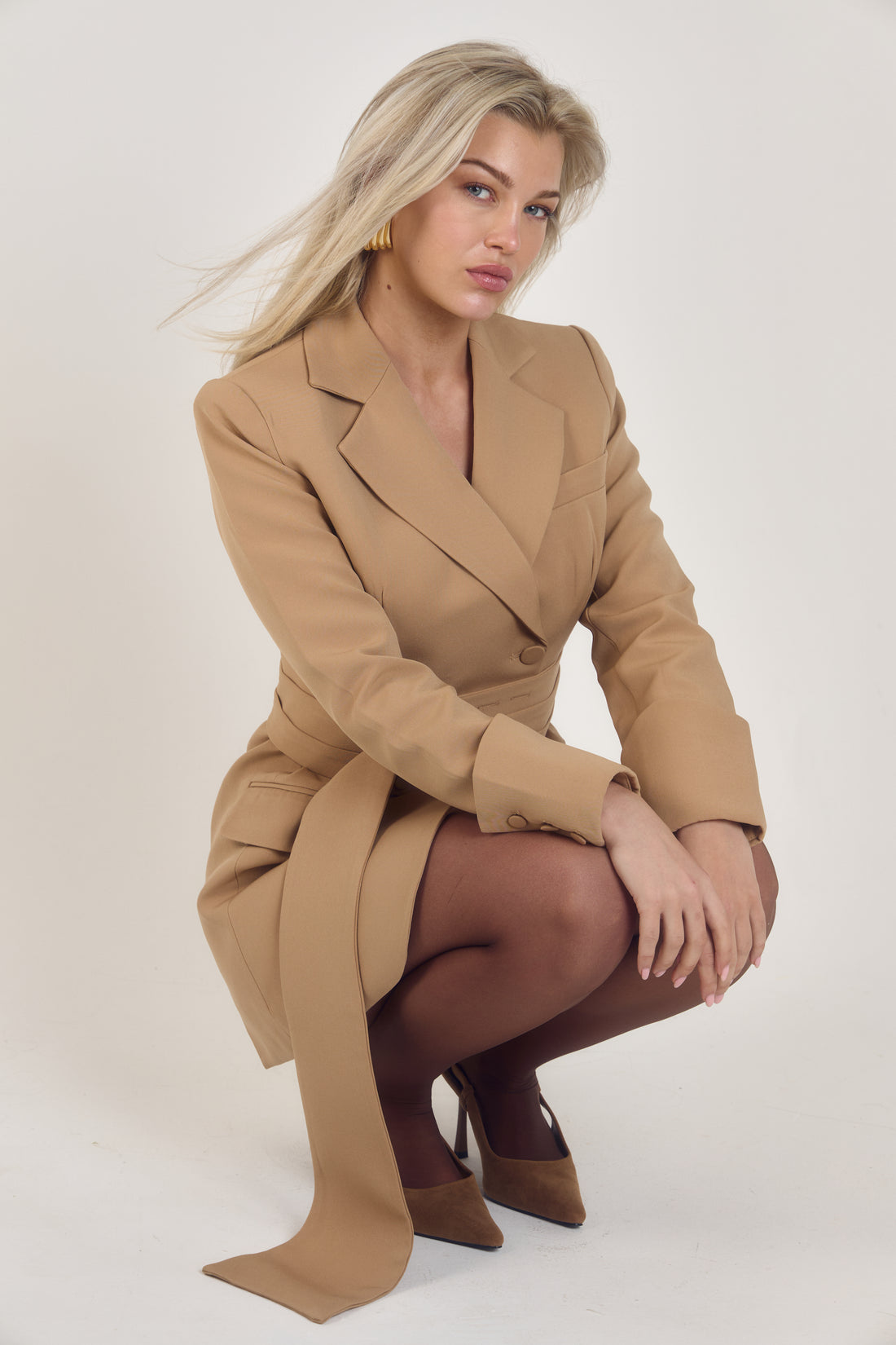 Front view of the Signature Oversized Belted Blazer Dress in Caramel Crème by Ardore London, featuring an oversized silhouette with a belted waist, soft caramel tone, and structured tailoring for effortless modern elegance