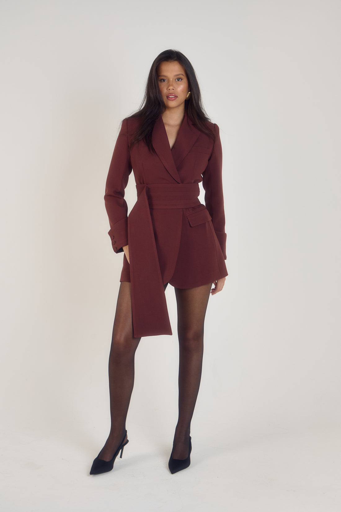 Ardore London’s premium burgundy tailored belted blazer dress in cherry chocolate, highlighting the oversized silhouette, structured tailoring, and luxurious fabric perfect for versatile styling